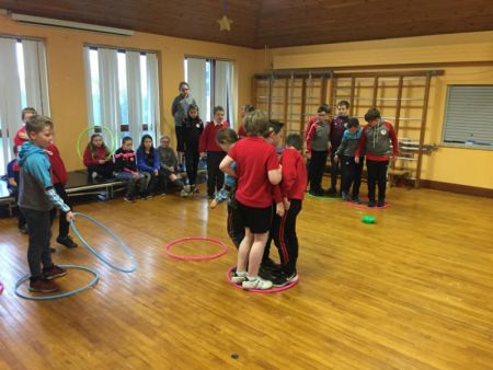 P6 & P7 playing a problem solving game during PE with Macartan.