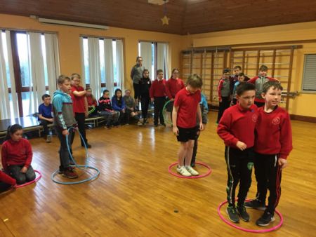 P6 & P7 playing a problem solving game during PE with Macartan.