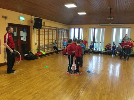 P6 & P7 playing a problem solving game during PE with Macartan.