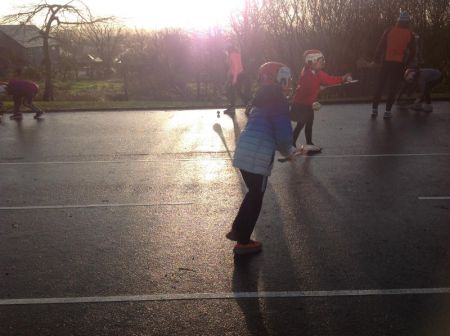 P6 & P7 hurlers practising some hurling skills.