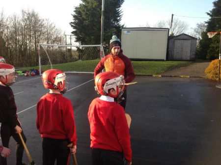 Tyrone County Hurler- Josh Ferguson teaching some hurling drills.