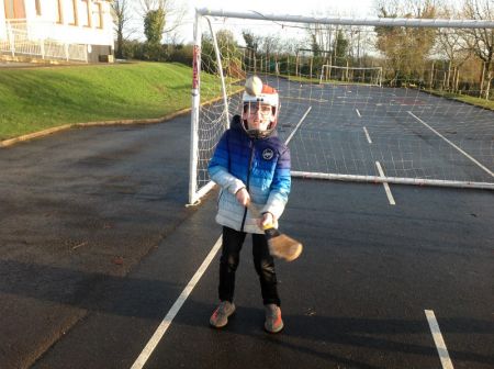 A P7 hurler practising some hurling skills.