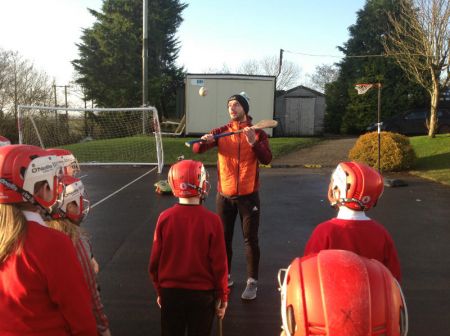 Tyrone County Hurler- Josh Ferguson teaching some hurling drills.